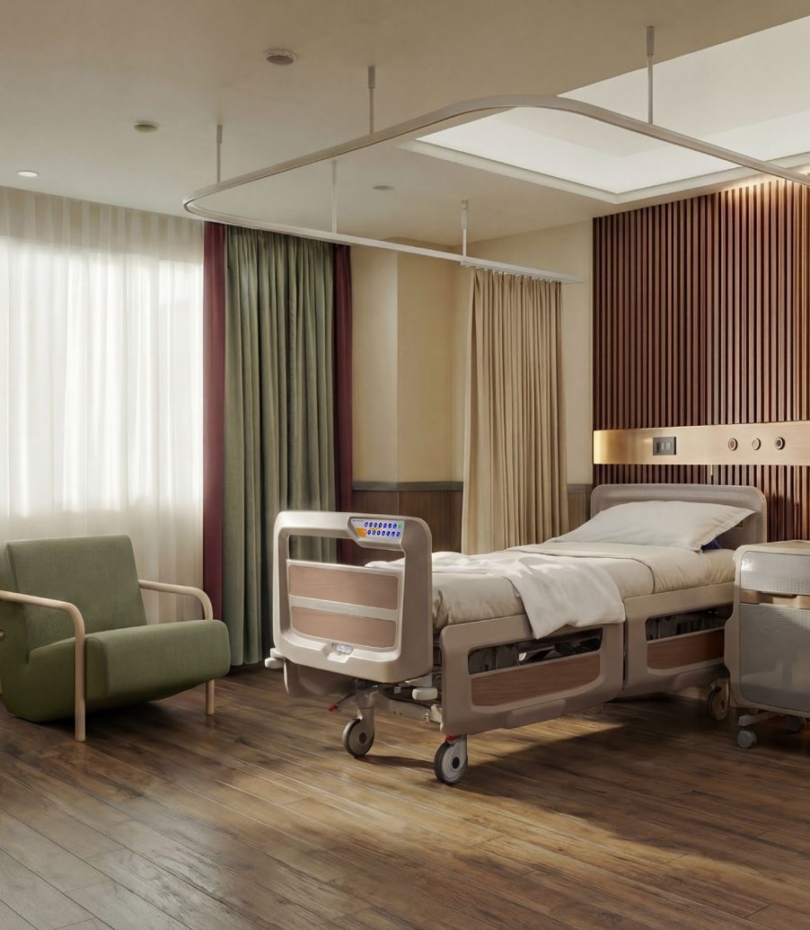 Cameră executive cu pat medical, fotoliu verde și iluminare indirectă